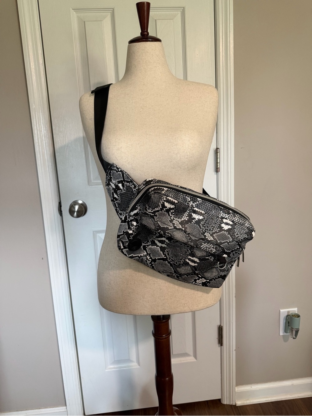 Tushbaby The Pack Snake Print Crossbody Baby Bag in Black & Gray